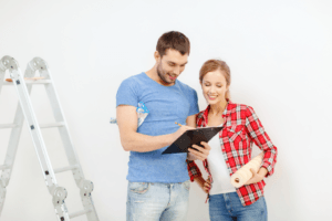 Man and woman talking about remodeling bathroom