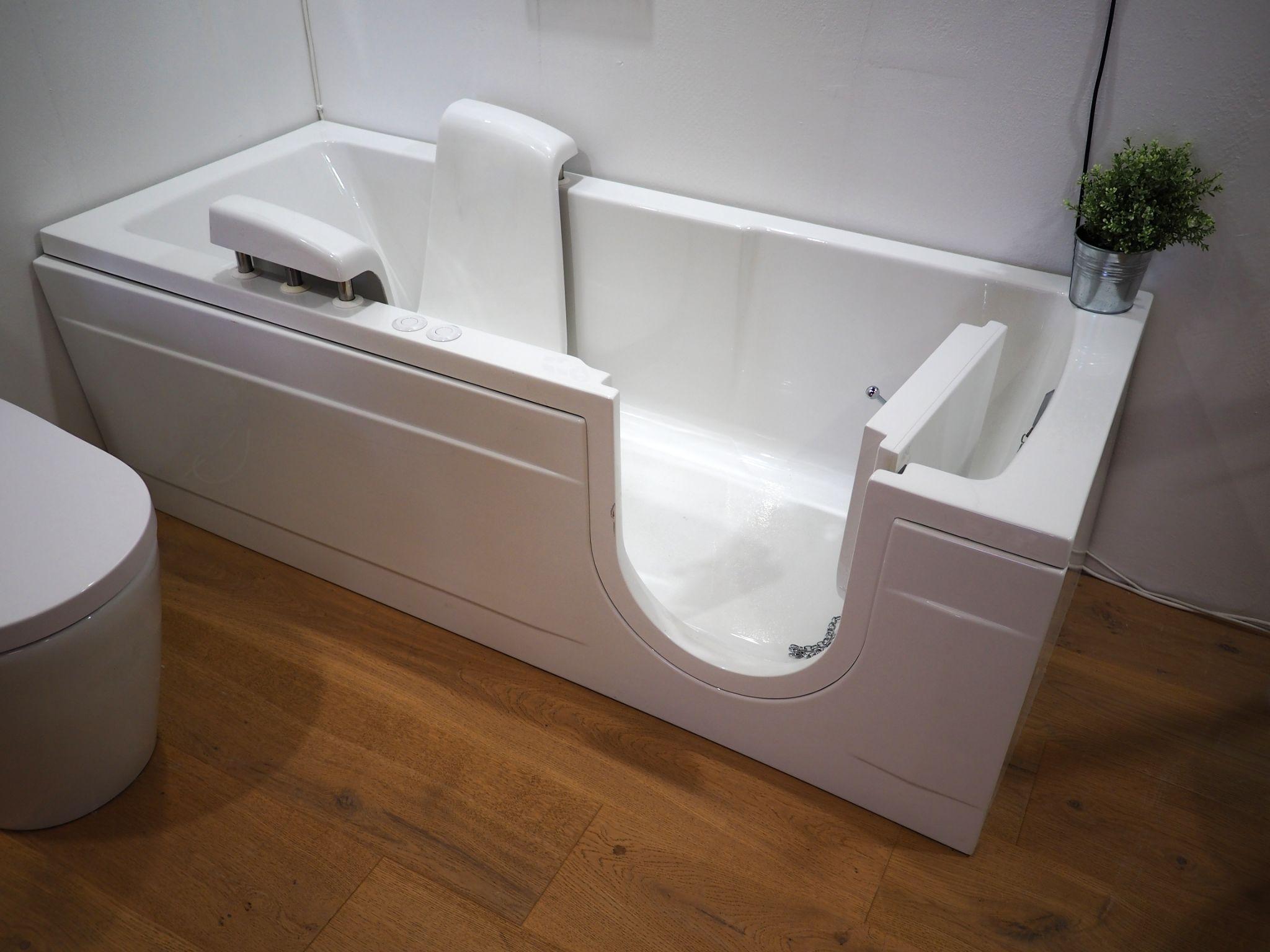 Handicapped disabled access bathroom bathtub with electric handles