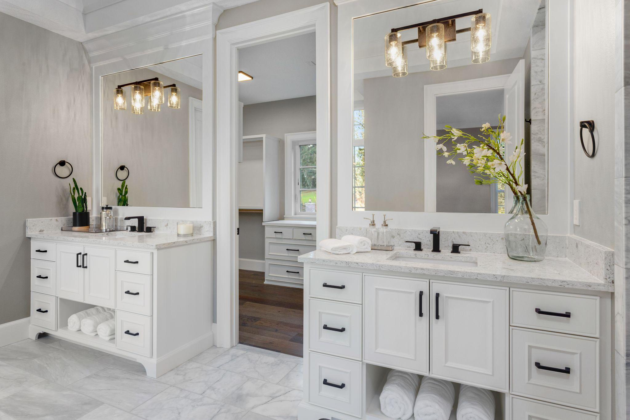 https://americanbathind.com/wp-content/uploads/2023/05/beautiful-bathroom-interior-with-vanity-mirror-and-cabinets.jpg